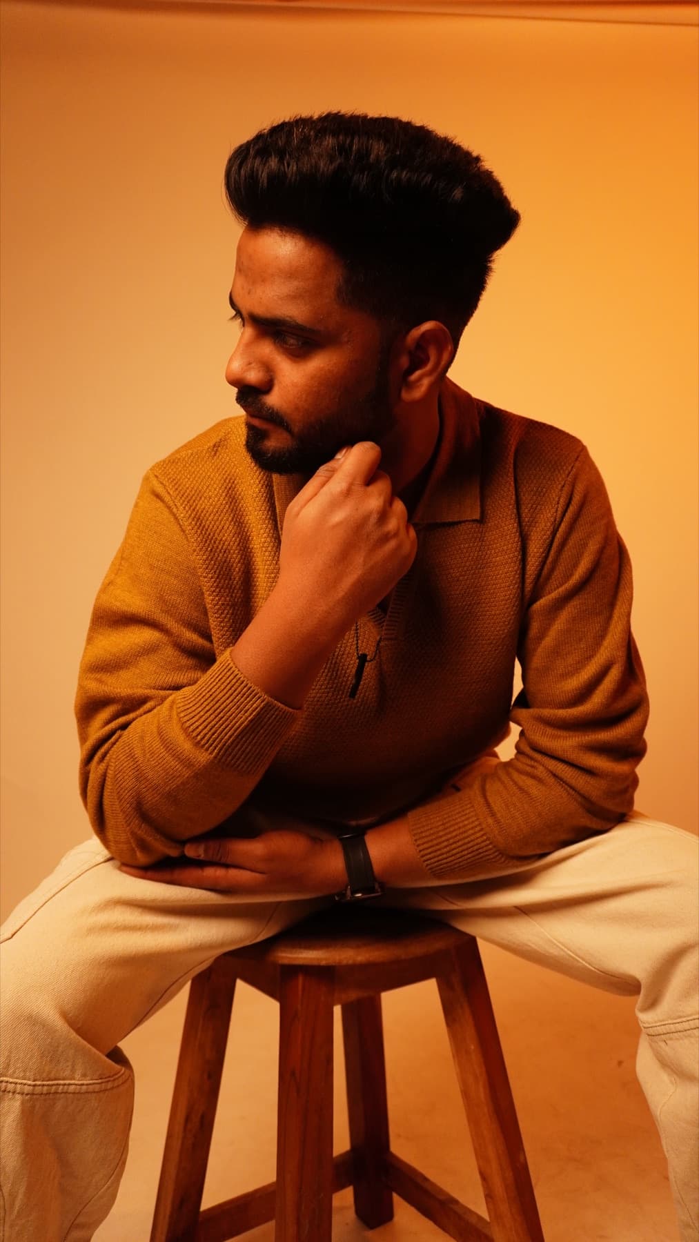 DropX seated portrait in warm light